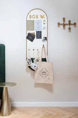 a wall with a bag hanging on a wall at Bob W Oosterpark in Amsterdam