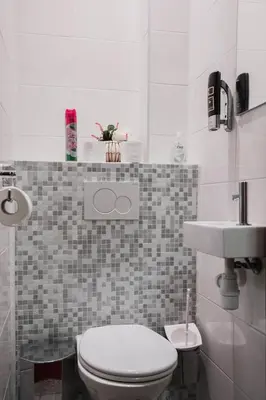 a bathroom with a toilet and a sink at Hotel Atlanta in Amsterdam