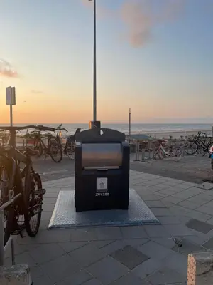 a tv sitting on the ground next to a beach at North Sea Spirit in Zandvoort