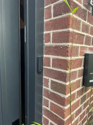 a brick wall next to a door with a pole at PRIVATE APPARTMENT 60m2 - CENTRE TOP LOCATION in Amsterdam