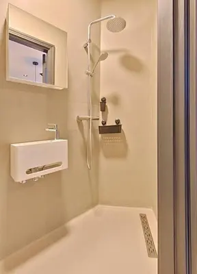 a bathroom with a shower and a sink at PRIVATE APPARTMENT 60m2 - CENTRE TOP LOCATION in Amsterdam