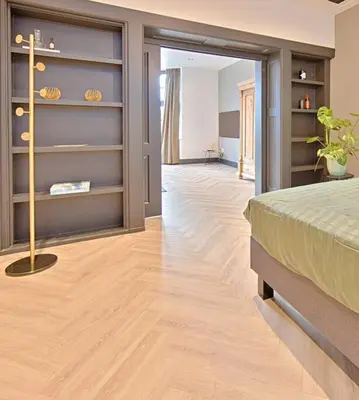 a room with a bedroom with a bed and a hallway at PRIVATE APPARTMENT 60m2 - CENTRE TOP LOCATION in Amsterdam