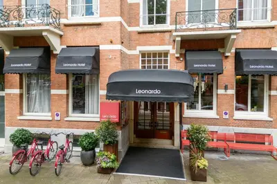 a group of bikes parked outside of a building at Leonardo Boutique Hotel Amsterdam Vondelpark in Amsterdam