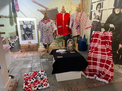 a display of clothes on display in a store at Holiday in Spakenburg t Afferhuus in Spakenburg