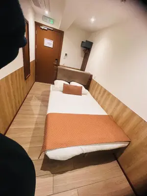 a bedroom with a bed in a room at OZO Hotels Cordial Amsterdam in Amsterdam