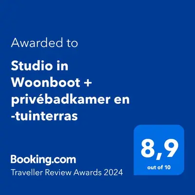 a screenshot of a phone screen with the text awarded to studio in woodott at Benedenverdieping in Woonboot met tuinterras in Utrecht