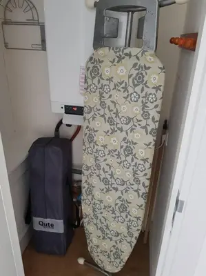 a snowboard leaning up against a wall in a room at Beach nearby, close to Amsterdam, The Hague -6p in Wassenaar