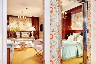 a bedroom with a bed and a desk at Hotel Estheréa in Amsterdam