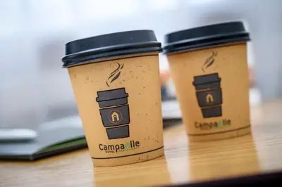 two cups of coffee sitting on a table at Campanile Hotel & Restaurant Gouda in Gouda