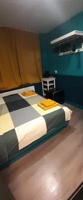 a large bed in a room with at JONI, not for parties, not a hotel, room with no kitchen in Amsterdam