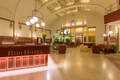 a hotel lobby with a rino hotel sign in the middle at Rho Hotel in Amsterdam