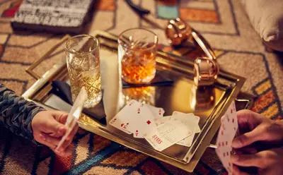 a tray with playing cards on a table at Banks Mansion - Boutique Hotel in Amsterdam