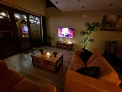 a living room with two couches and a coffee table at DW Castricum in Castricum