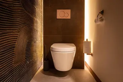 a bathroom with a white toilet in a room at Appartement met tuin in Haarlem centrum(Vijfhoek) in Haarlem