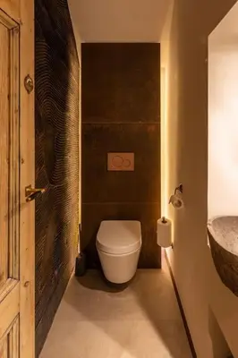 a bathroom with a toilet and a sink at Appartement met tuin in Haarlem centrum(Vijfhoek) in Haarlem