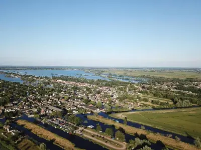 an aerial view of a town next to a river at SéSé in Vinkeveen