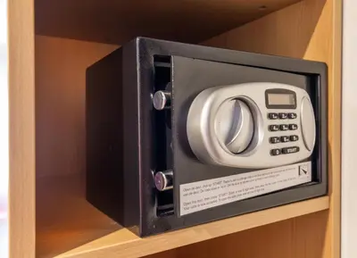 a microwave oven sitting on top of a shelf at Bastion Hotel Amsterdam Zuidwest in Amsterdam