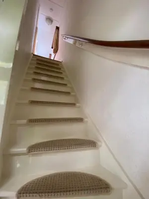 a staircase in a building with a stair case at La Luna - Gino in Heerhugowaard