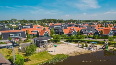 an aerial view of a suburb with a playground at De Beemster | Holiday park near Amsterdam in De Rijp