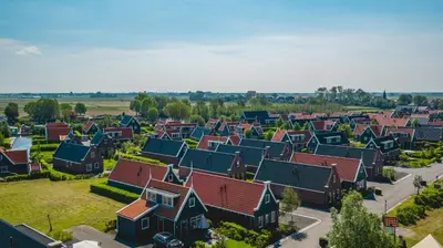 an aerial view of a small village with houses at De Beemster | Holiday park near Amsterdam in De Rijp
