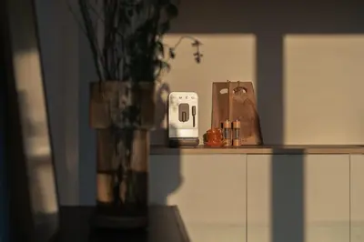 a shelf with a phone and a bag on it at Elegant Boutique Apartment 45m2 w Amazing Views in Amsterdam