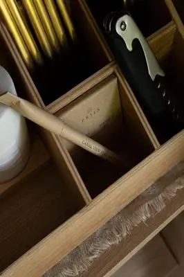 a wooden box with a knife and matches at Canal View Stay Amsterdam in Amsterdam