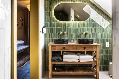 a bathroom with a sink and a mirror at The Butchersfarm in Ter Aar