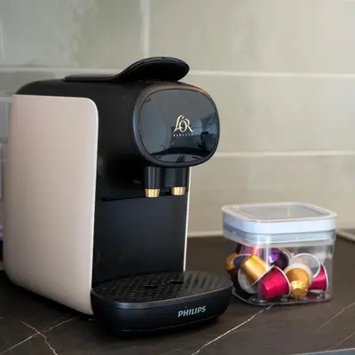 a coffee maker sitting on top of a counter at 4 to 6 persons Tulpenacker waterfront in Roelofarendsveen