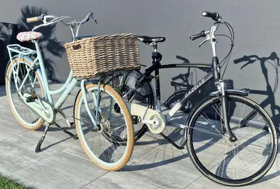 two bikes parked next to each other on a sidewalk at Studio Flevo Batavia in Lelystad