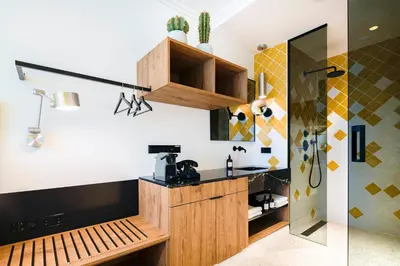 a kitchen with a wooden counter and a sink at The Highlander Amsterdam in Amsterdam