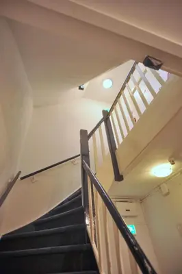a stairway in a building with a stair case at Hotel Abba in Amsterdam