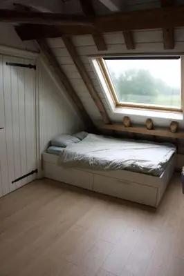 a bedroom with a bed in a room with a window at Farmvilla with hottub and outdoor kitchen in Beets