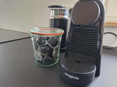 a glass jar sitting next to a toaster on a counter at Fenix Edam in Edam