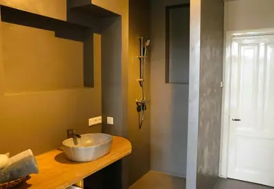 a bathroom with a bowl sink on a counter at B&B Vechtzicht in Weesp