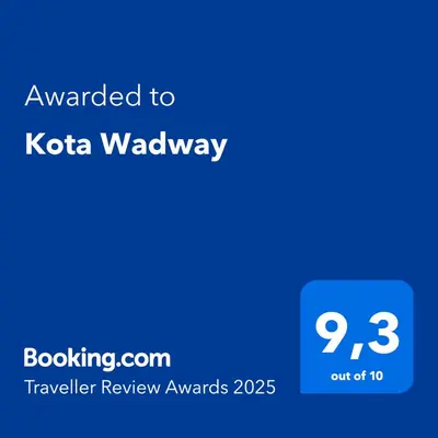 a blue text box with the words awarded to kota waverley at Finse Kota met privé Sauna en Hottub in Spanbroek