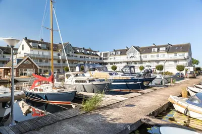 a group of boats are docked in a harbor at Luxury Apartment near Utrecht & Amsterdam in Breukelen