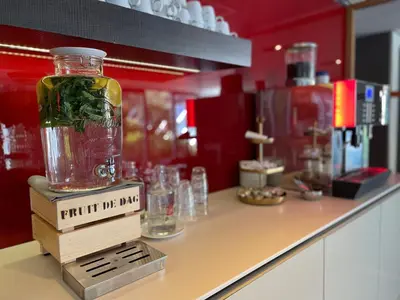 a bottle on top of a box on a counter at Hotel Ernst Sillem Hoeve in Den Dolder