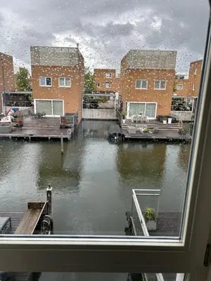 a window with a view of a body of water at Cairo in Almere
