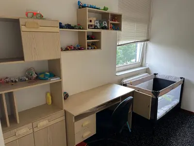 a room with a desk and a sink in it at Cairo in Almere