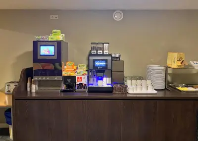 a coffee machine sitting on top of a counter at XO Hotels Infinity in Amsterdam