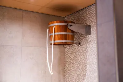 a shower with a barrel on the wall at Résidence Lage Vuursche in Lage-Vuursche