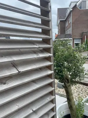 a stack of stairs in front of a house at Tiny beachhouse - free parking in Noordwijk