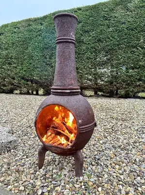 a fire oven sitting on a rocky ground at Have a nice stay! - Beachhouse Zonneweelde in Noordwijk