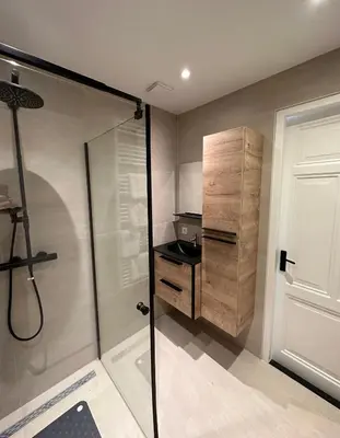 a bathroom with a shower and a walk in shower at @92 in Zandvoort