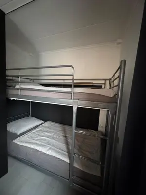 an empty bunk bed in a small room at La Luna - Danny in Heerhugowaard