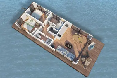 a small boat in the water on the water at Surla houseboat 