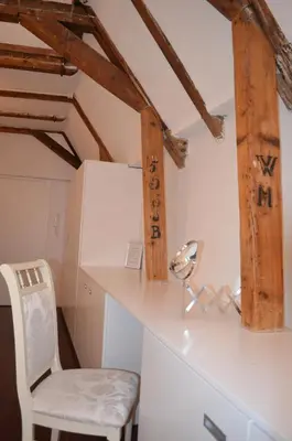 a room with a white desk and a chair at Rembrandtplein Bed & Breakfast in Amsterdam