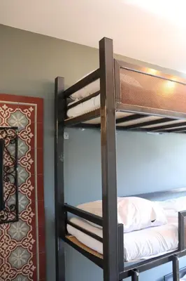 a couple of bunk beds in a room at Amsterdam Hostel Annemarie in Amsterdam