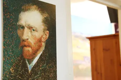 a painting of a man with a red beard at Bicycle Hotel Amsterdam in Amsterdam