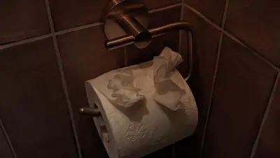 a roll of toilet paper hanging on a wall at Locatie Downtown in Amsterdam